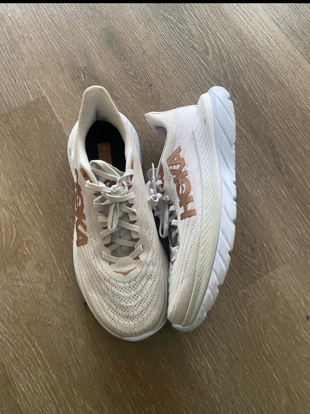 Hoka White Running Shoes with Rose Gold Logo